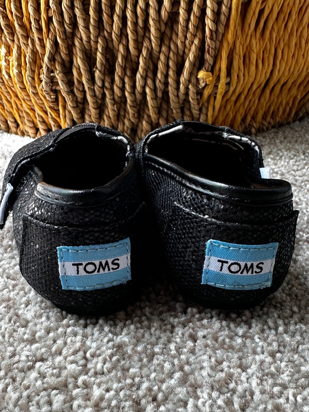 Toms Black Kids Slip-On Shoes with Blue Logo Patch